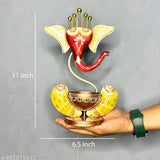 Metal Ganesha T-Light Holder, handcrafted Indian artistry, illuminates sacred spaces with spiritual elegance