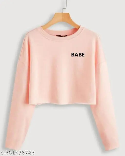 Long sleeve printed cotton crop top for women, vibrant design on display