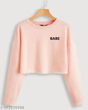 Long sleeve printed cotton crop top for women, vibrant design on display