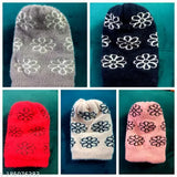 Gray and black crocheted cap with floral pattern and fur lining inside