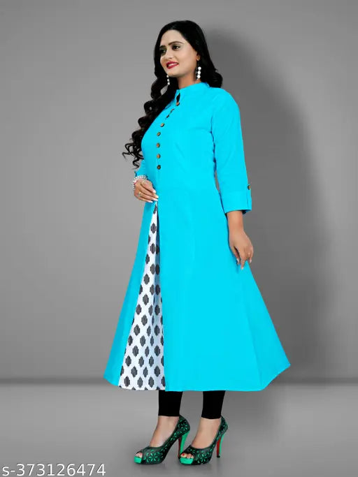 Blue kameez with flared sleeves and contrasting border, worn by person standing against grey background