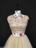 Cream-colored embellished sequinned semi-stitched lehenga with unstitched blouse and dupatta, Art Silk/Net fabrics, Indian embroidery