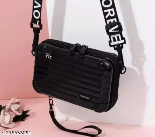A mini suitcase style sling purse with multiple colors and a detachable shoulder strap, suitable for women and girls