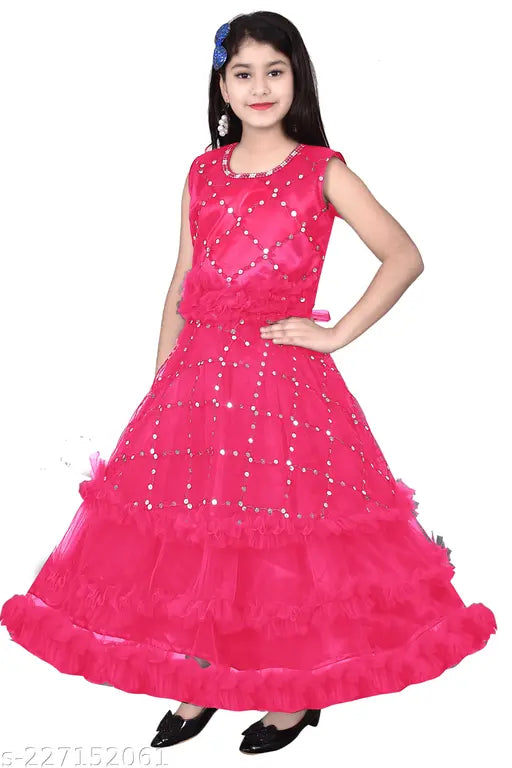 The image is of a child wearing a red party dress