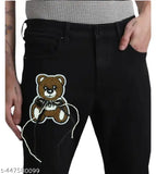 Men's fashion black denim jeans with a small teddy bear applique