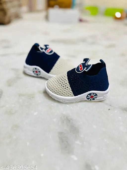 Blue and white kids' sneakers with velcro closure