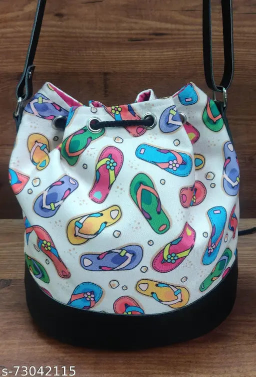 Graphic print canvas bag, suitable for shopping or hiking, features two compartments - one wet and one dry, with durable string back straps