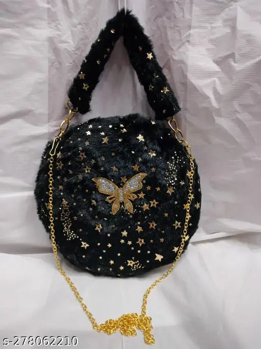 Miniature black purse with gold stars and butterflies