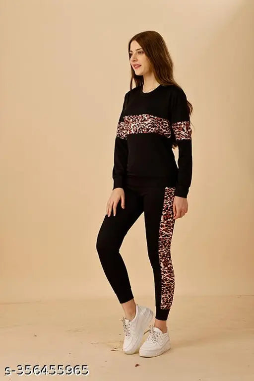 Black striped cotton blend women's summer tracksuit with long sleeves and matching leggings, new fashion trend for activewear and gymwear