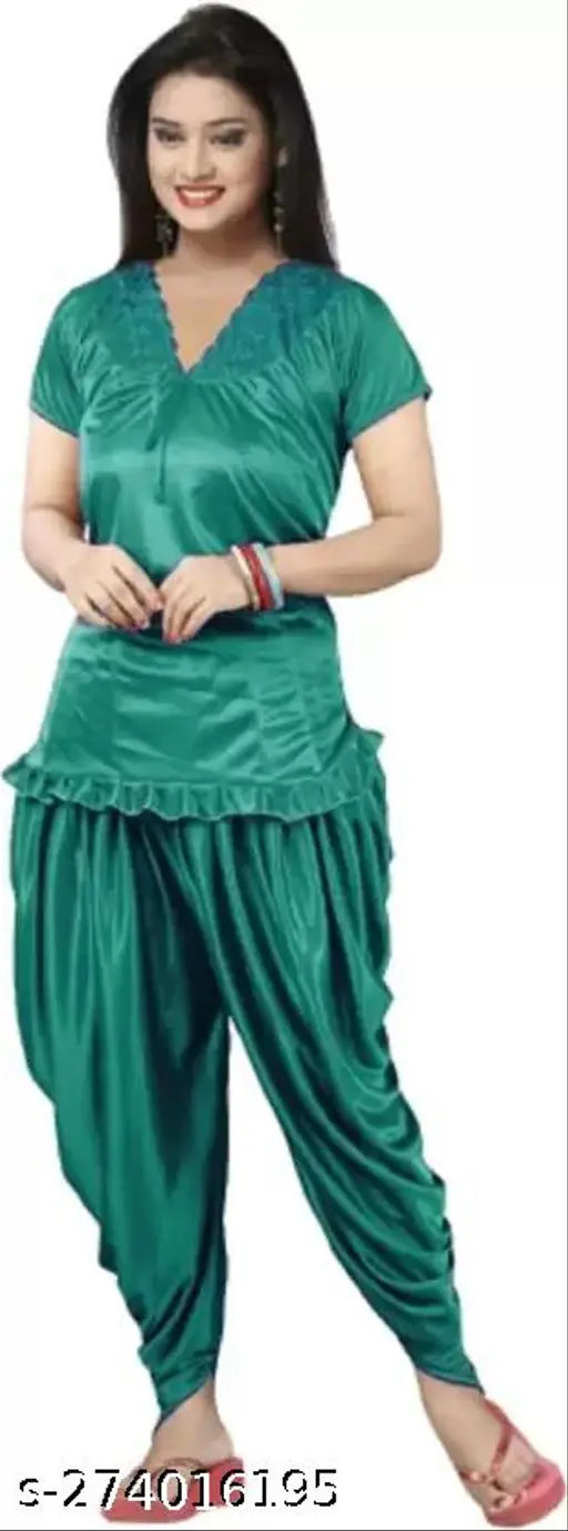 Solid green satin pyjama set for women, featuring v-neck top with ruffled half sleeves and patiala pants, luxurious lace details, made in India