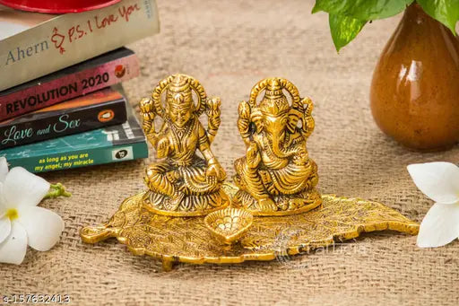 Gold metal Paheli Craft Lord Laxmi Ganesh idol statues on lotus flower with diya, 20x10x10cm