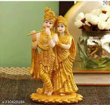 Gold-plated Radha Krishna showpiece statue, multicolor resin Krishna idol for home living room decoration or corporate gifts. Approximate dimensions: 11cm length x 19cm height x 11cm breadth. Made in India