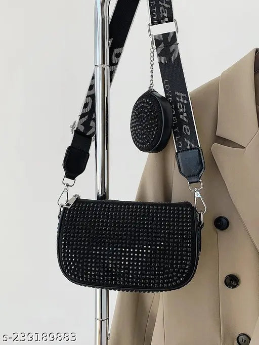 Black rhinestone crossbody bag, with a chain link strap, multiple card slots, and a coin purse