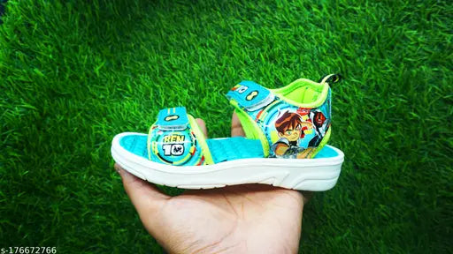 Orange and green EVA sole Chota Bheem kids sandals for summer wear, featuring cartoon character designs. Velcro fastening detail for easy adjustment. Size: 18-24 months