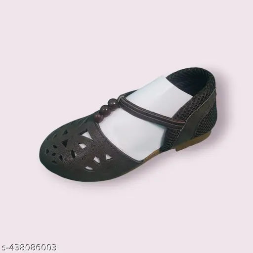 Black and white strapped sandal with round toe