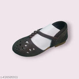 Black and white strapped sandal with round toe
