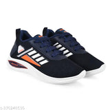 Kids blue sports shoes with white sole and orange logo