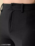 Black cotton bell-bottom pants with solid color and zip closure