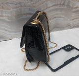 Black croc-skin, large sling bag with long chain strap, 2 pockets, zip closure, suitable for women or girls