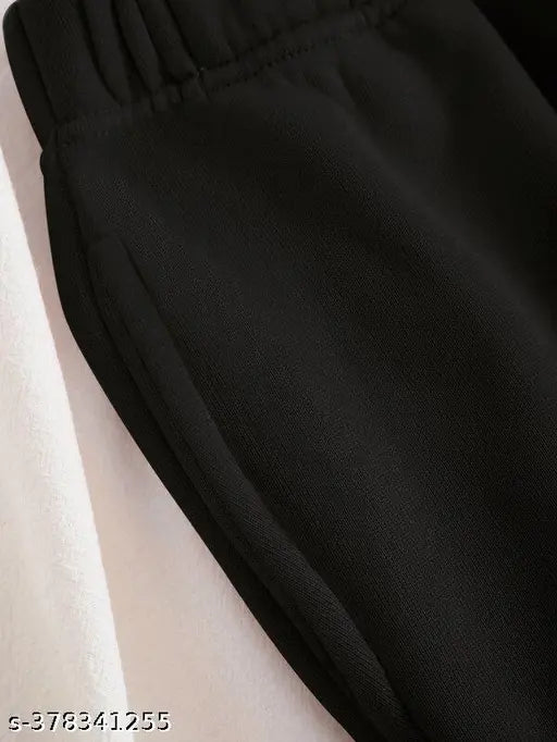 Women's jogger pants in black with placement print