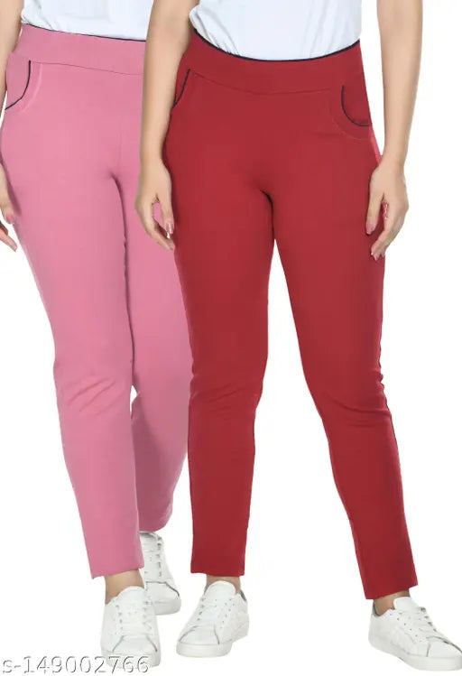 Pink cotton blend solid stretchable jeggings pack of 2 for women's everyday use, mid-waist design with pockets and elasticated waistband. Available in sizes: 26, 28, 30, 32, 34, 36, 38 (inches). Made in India