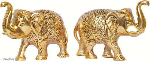 This is a set of two metal elephants, gold-finished, medium size, with intricate designs, possibly for decoration or religious purpose. Good luck charm, suitable as a home office table showpiece or a gift
