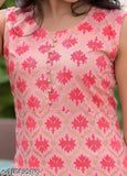 Peach-colored rayon sleeveless kurti set with palazzos, printed net pattern on display