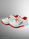 White and red sports shoes for boys, featuring illuminated soles