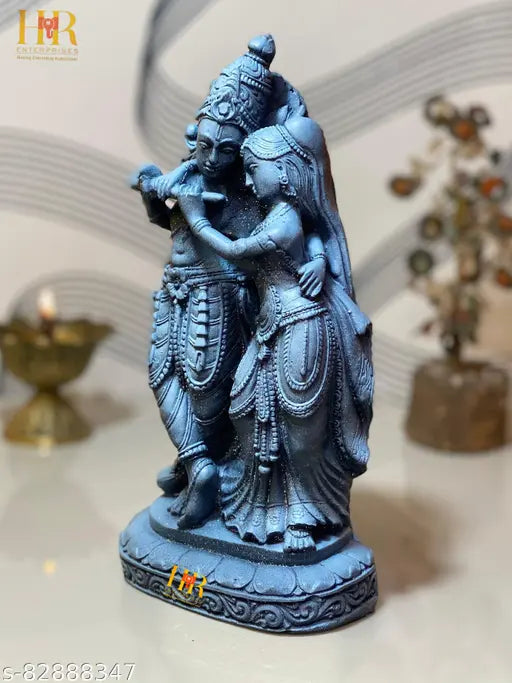 Grey stone statue of Radha Krishna, intricate detailing, idol for gifting or home decor, showcasing divine love