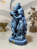 Grey stone statue of Radha Krishna, intricate detailing, idol for gifting or home decor, showcasing divine love