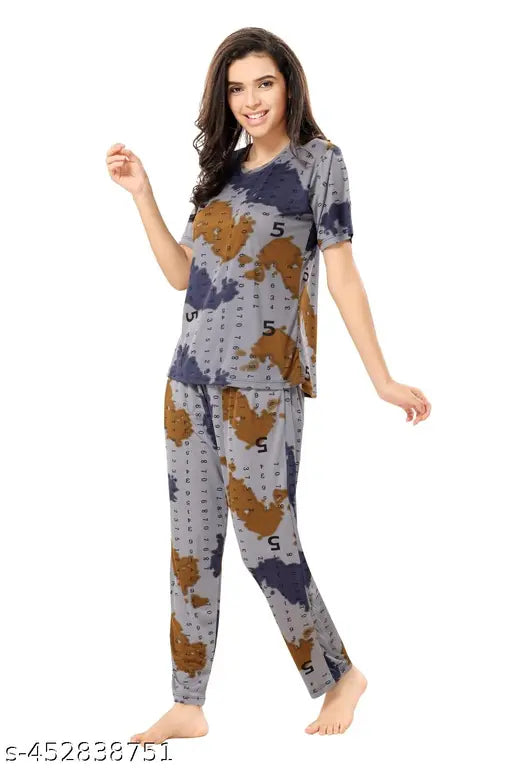 Large print polycotton women's night suit with short sleeves, featuring a colorful pattern. Available in M, L, and XL