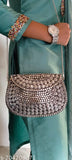 Metal clutch purse with chain strap, India