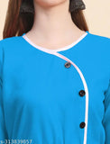 White cotton blend one-piece kurti for girls, solid design in multiple colors including green, wine, maroon, blue, black, yellow, mustard, mehndi, firozi, parrot, and pink. Knee-length flared style with button patent and cotton belt. Sizes from S to 3XL. Made in India
