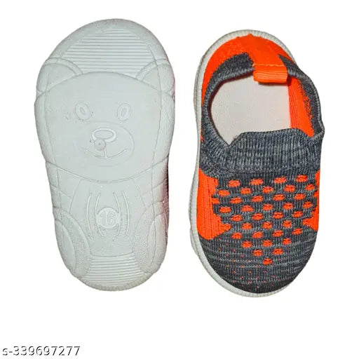 Blue, red, and white sandal with a teddy bear foot design for children