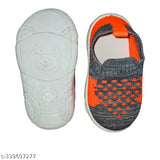 Blue, red, and white sandal with a teddy bear foot design for children