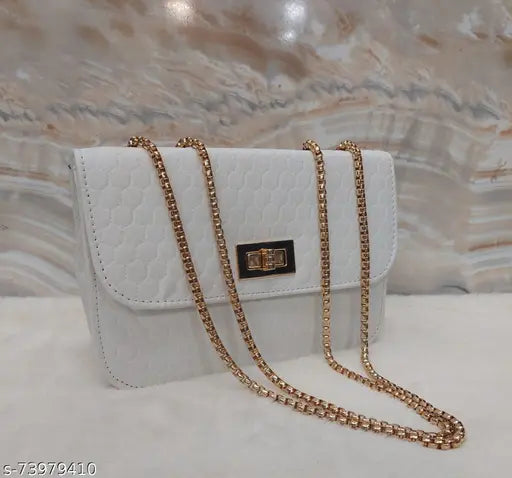 White crossbody bag with chain straps, clear embellishments