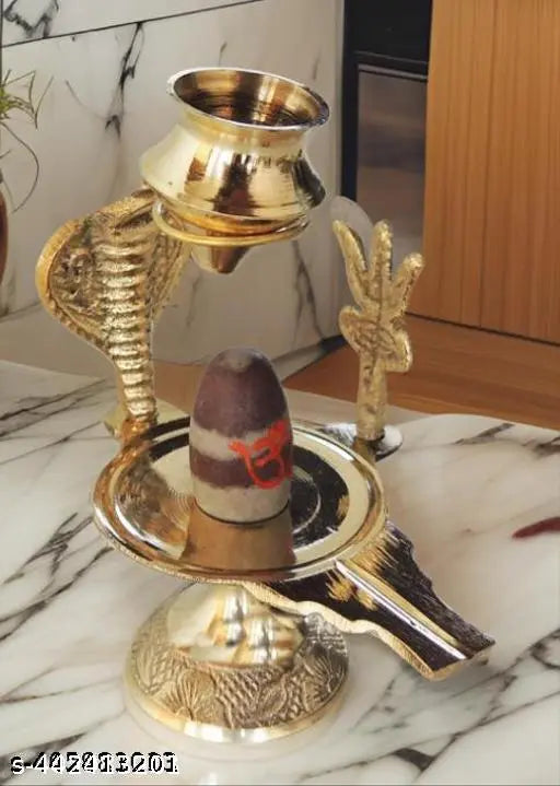 Gold brass Narmadeshwar Shivling with Trishul and temple stand, 6cm x 7cm x 6cm