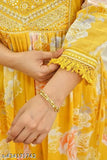 Yellow rayon Anarkali kurti set for festive, featuring printed design and three-quarter sleeves