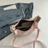 Black canvas shoulder bag with detachable adjustable belt