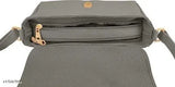 Black leather satchel with zip closure and adjustable shoulder strap