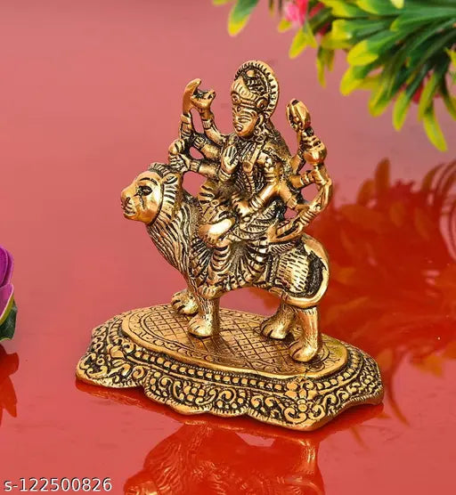 Maa Durga metal hand carving, idol for pooja, gold-colored sculpture of Maa Shakti on lion, small showpiece figurine for Navratri home decor