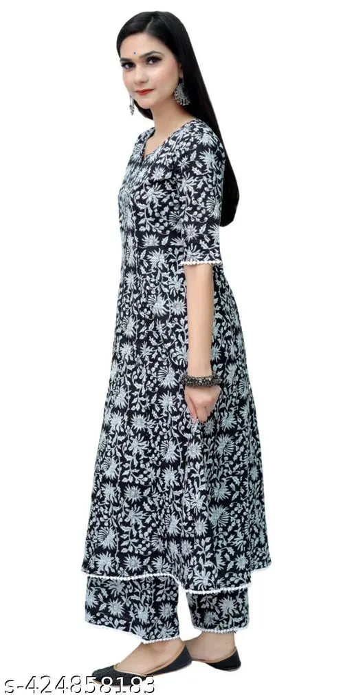 Pretty women's rayon kurta set with palazzos, short sleeves, printed net design. Single size options S-XXXL, India origin