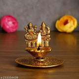 Antique gold plated metal Lakshmi Ganesh hand diya for premium home decorative showpiece, perfect for Diwali or housewarming gifts. (125 characters)