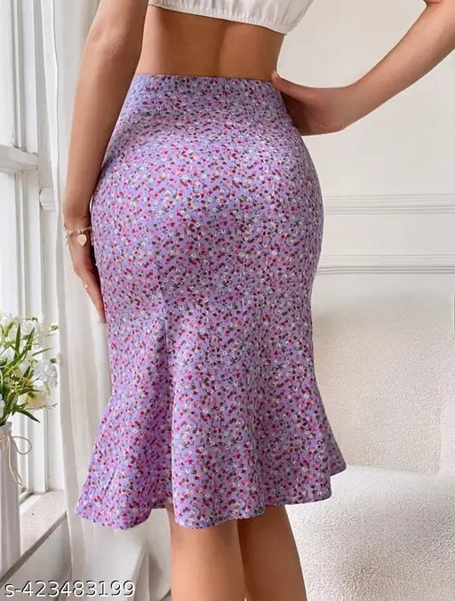 A woman wearing a mid-thigh pencil print skirt