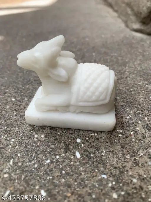 White marble Shiv Nandi Idol, 2-inch size for Pooja Mandir. Handcrafted, spiritual art for home altar and sacred decor. Indian origin