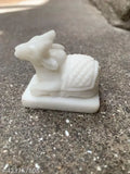 White marble Shiv Nandi Idol, 2-inch size for Pooja Mandir. Handcrafted, spiritual art for home altar and sacred decor. Indian origin