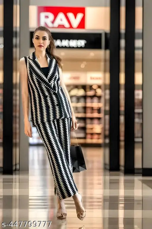 Women's comfortable zig-zag design cotton blend co-ord set, featuring a V-neck jacket and palazzo pants with intricate crochet lace detailing. Perfect for casual or semi-formal occasions, this Western Wear ensemble is ideal for everyday style with a rugged charm. Made in India