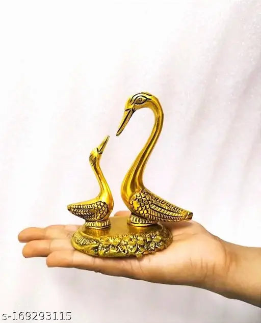 Golden shine oxidized white metal Vastu swan statue pair, hand-painted decorative showpiece with a royal touch