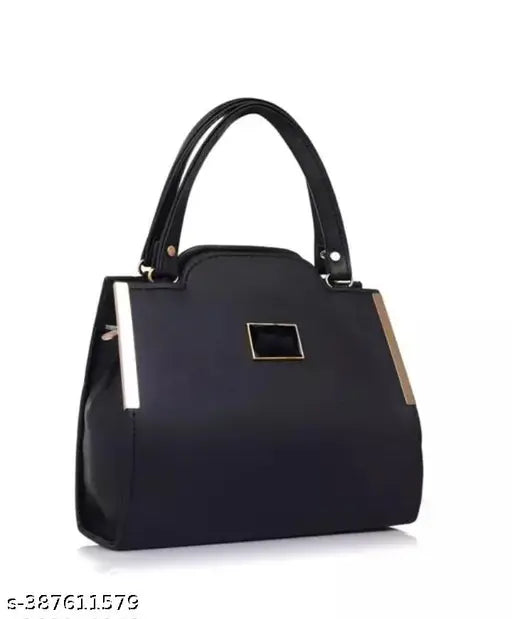 Black leather handbag with metallic accents