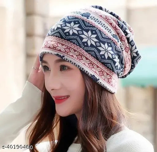 This is a black, knitted beanie with a skull pattern on it. It has a snug fit and appears to have a cuff around the neck